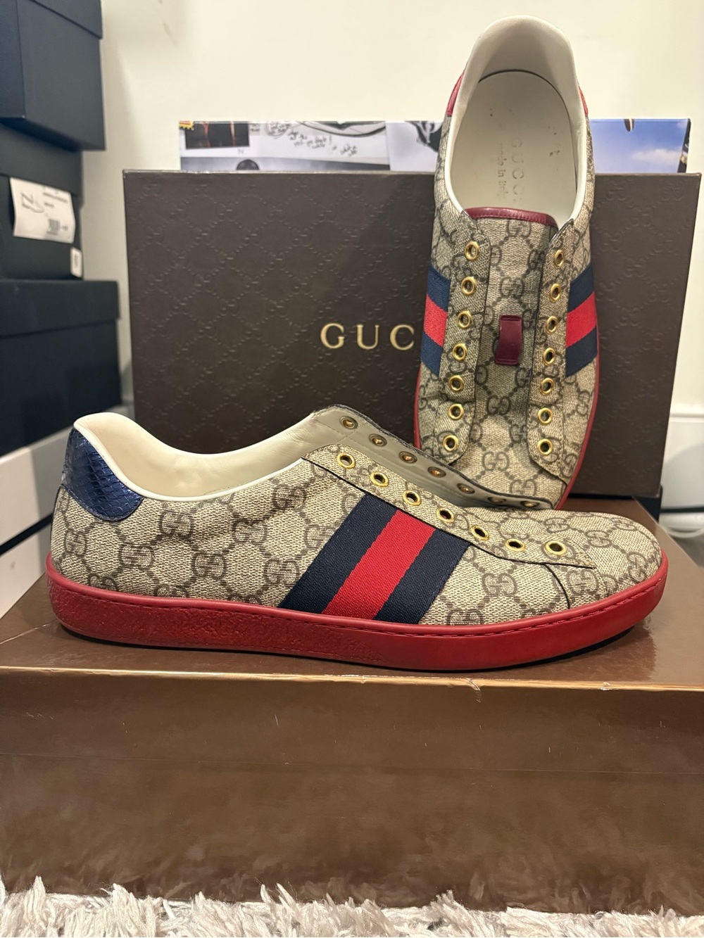 Gucci Ace GG Supreme sneakers in beige/ebony with red and blue Web stripes